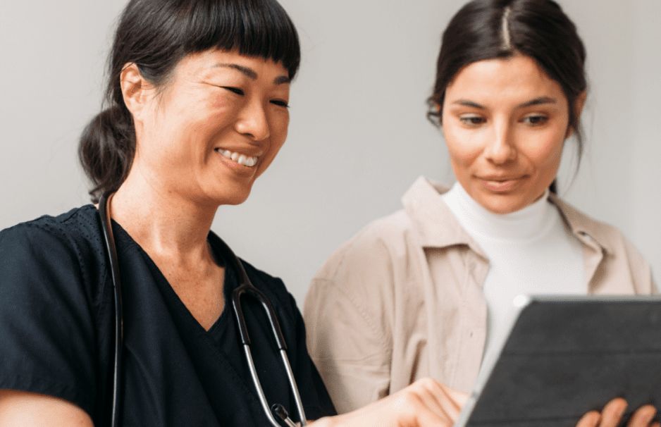 A study coordinator going over information with a patient
